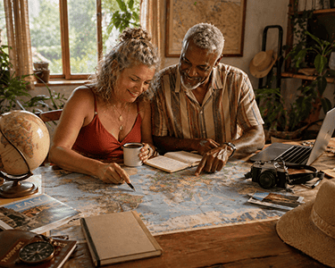 Intentional Travel Planning based on the way you want to feel. A colored couple planning the trip of a lifetime.